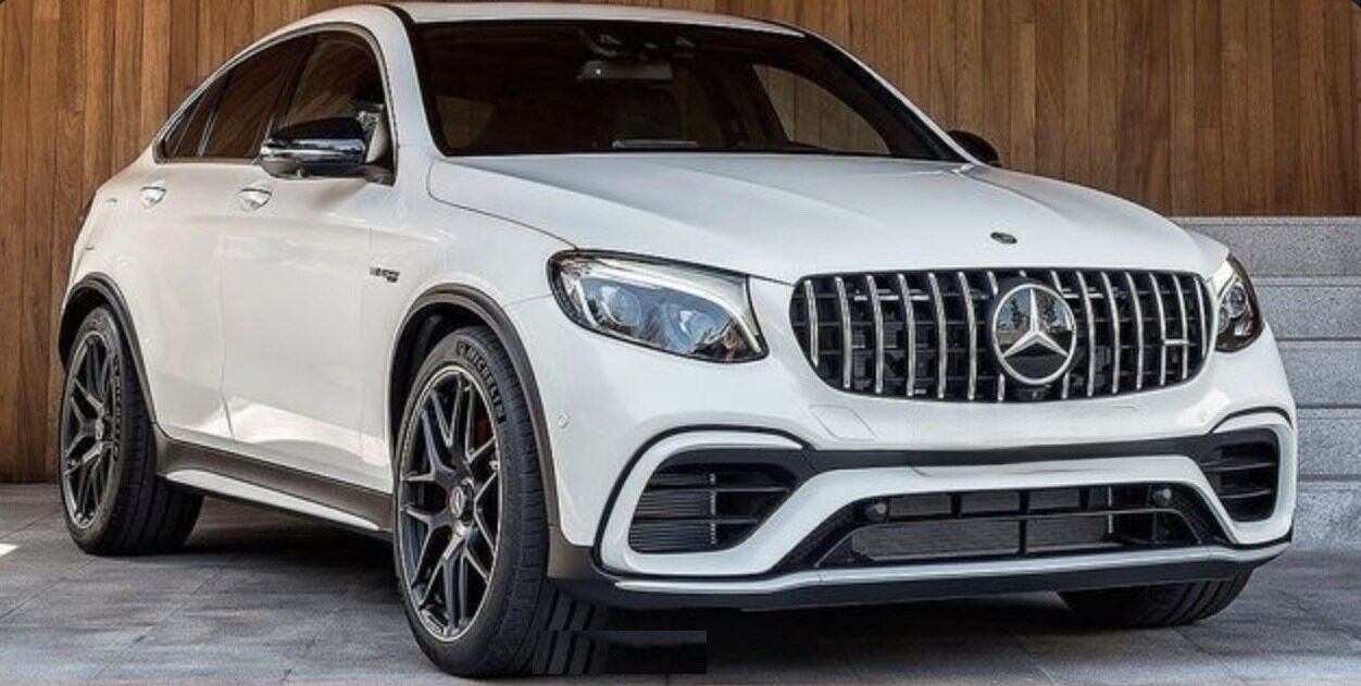 White Mercedes-AMG GLC 63 S Coupe front view — luxury SUV rental Dallas-Fort Worth